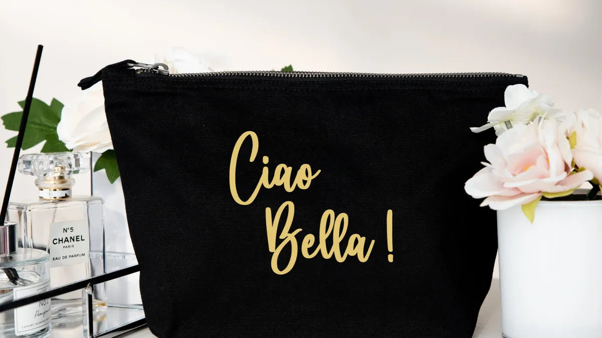 Black pouch with 'Ciao Bella!' text on a white background